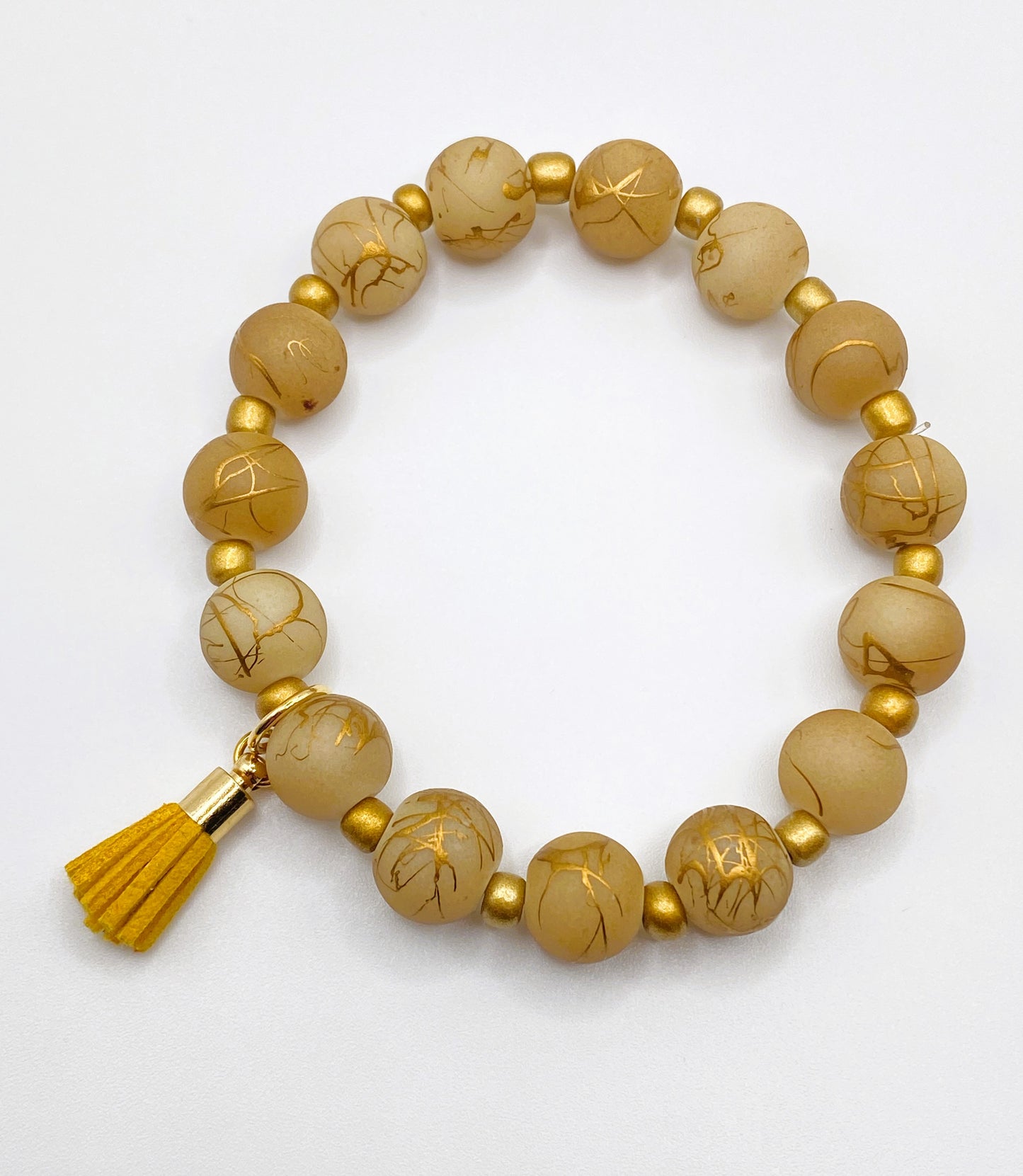 Gold Bracelet with Tassel Charm